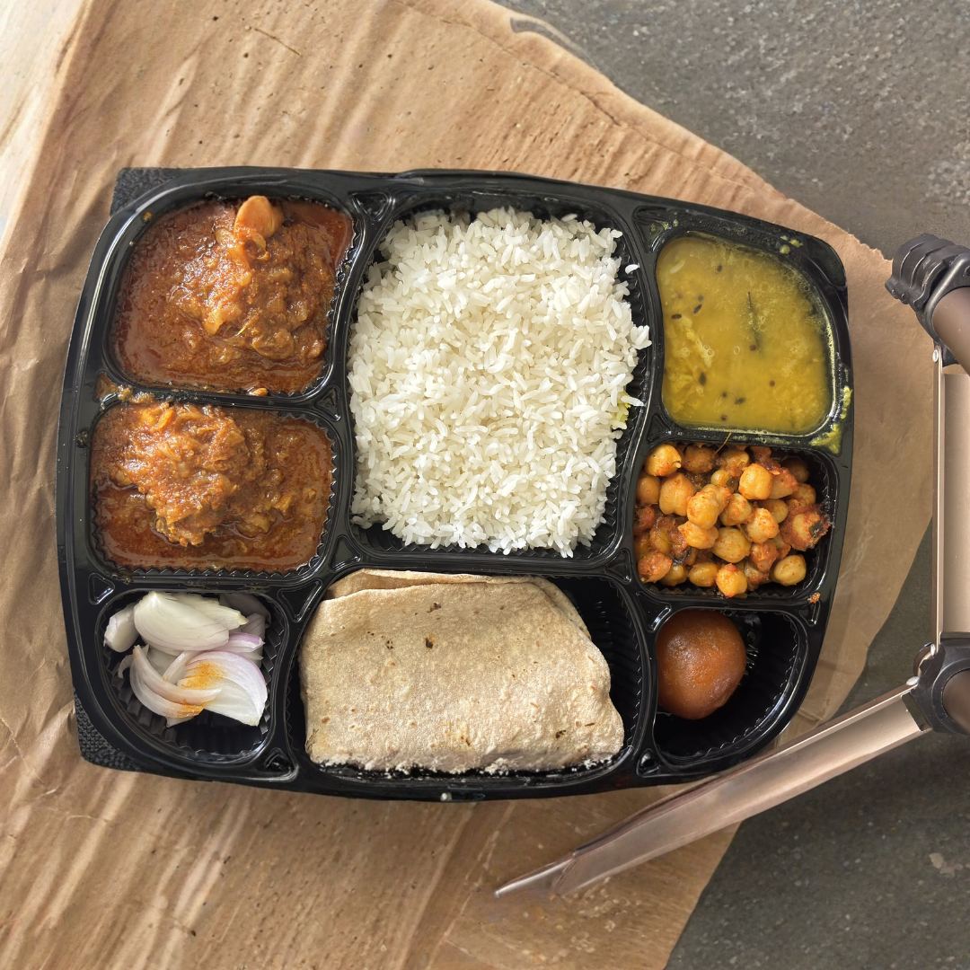 Zomato order rating screenshot — veg thali